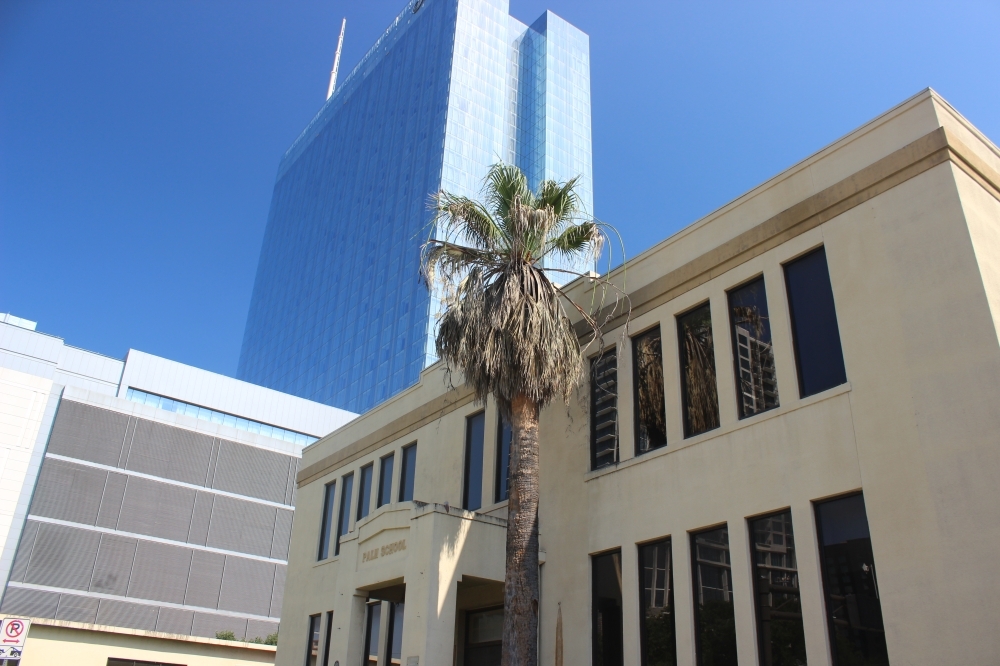 Austin's downtown Palm District is home to several modern and historic landmarks, including the Palm School building now home to Travis County offices. (Ben Thompson/Community Impact Newspaper)
