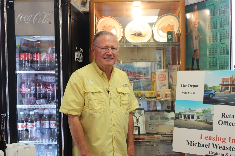KT Antiques owner Bill Bain opened the antique store in 2010. (Morgan Jones/Community Impact Newspaper)