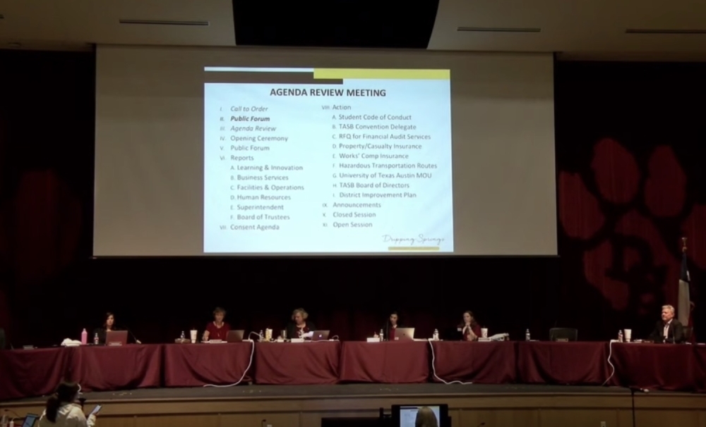 Screen shot of a school board meeting