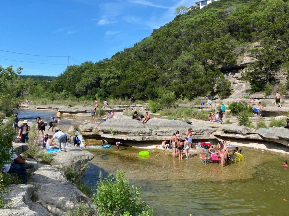 The city of Austin collected samples from Bull Creek on Aug. 6 after a swimmer reported signs of harmful algae exposure. (Brian Rash/Community Impact Newspaper)
