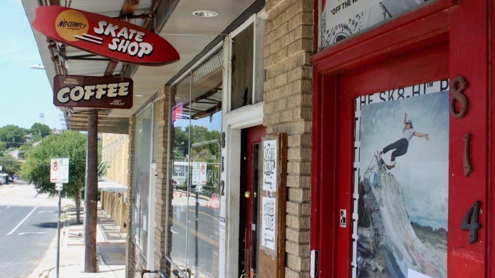 The demolition of the building housing No-Comply Skate Shop and Idlewild Coffee was put on indefinite hold in August. (Ben Thompson/Community Impact Newspaper)