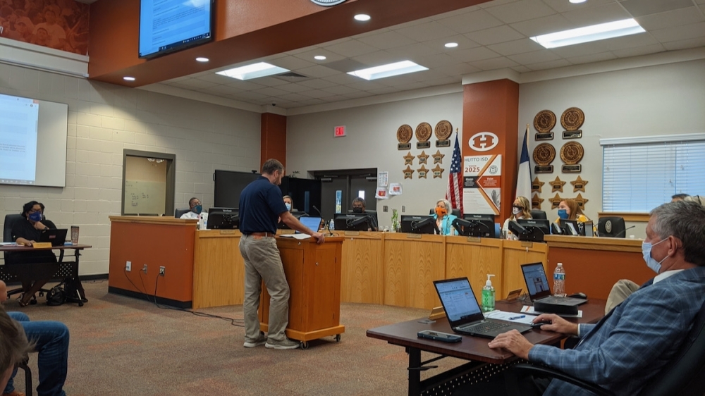Jason Nichols addresses the Hutto ISD school board. (Carson Ganong/Community Impact Newspaper)