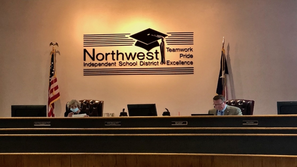 Northwest ISD Superintendent Ryder Warren (right) and Northwest ISD board of trustees President Anne Davis-Simpson sit at the board of trustees Sept. 13 meeting. (Bailey Lewis/Community Impact Newspaper)