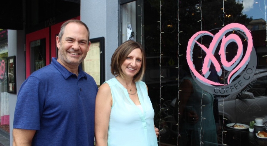 Husband and wife David Martin and Linda McCall own XO Coffee Company in downtown Plano. (Erick Pirayesh/Community Impact Newspaper)