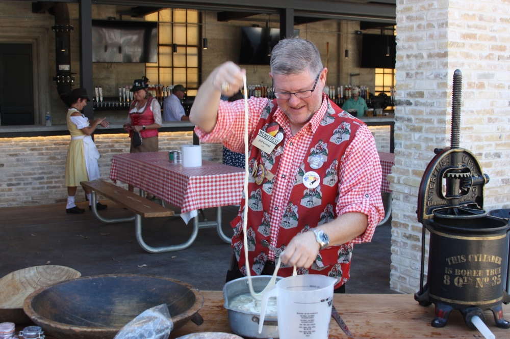 Jeff Goebel, seen here holding sausage casings for a demonstration he gave on traditional sausage making Saturday.