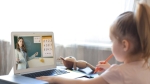 girl looking at laptop screen