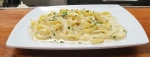 An Italian classic, the Fettuccine Alfredo ($10) is a homemade specialty at The Purple Garlic. (Jarrett Whitener/Community Impact Newspaper)