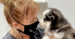 woman and puppy