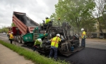 Construction crews working on Anderson Mill Road