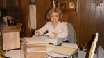 vintage photo of Janelle sitting at table