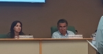 Hollywood Park Council Member Deborah Trueman and Mayor Oscar Villarreal listen to Town Secretary Patrick Aten's presentation on possible new rules for the town's swimming pool. (Edmond Ortiz/Community Impact Newspaper)