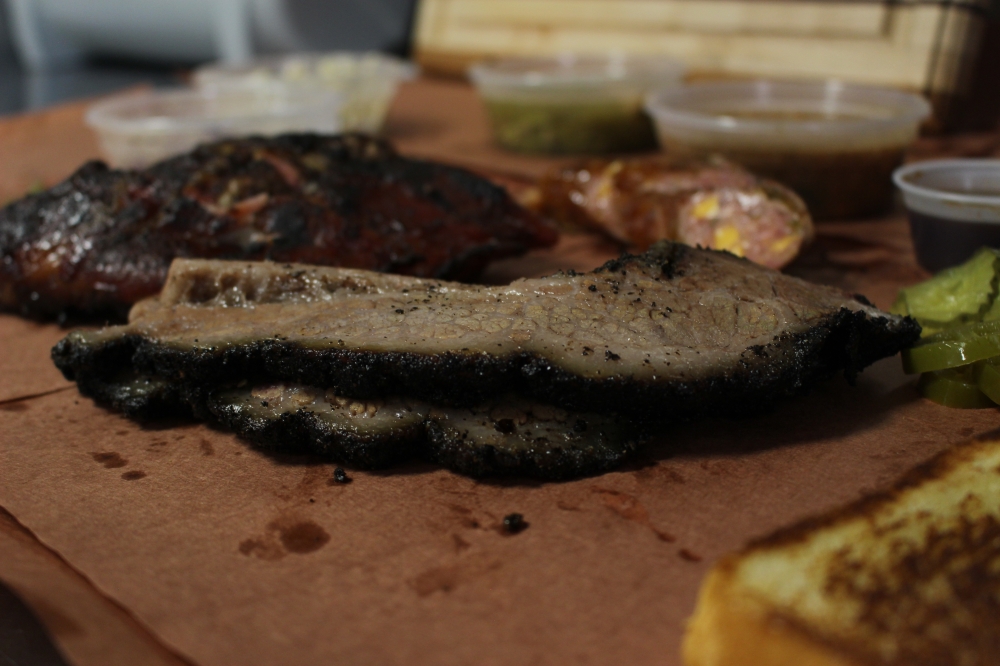 The barbecue joint offers meat sold by the pound, including brisket, and a variety of sides. (Chandler France/Community Impact Newspaper)
