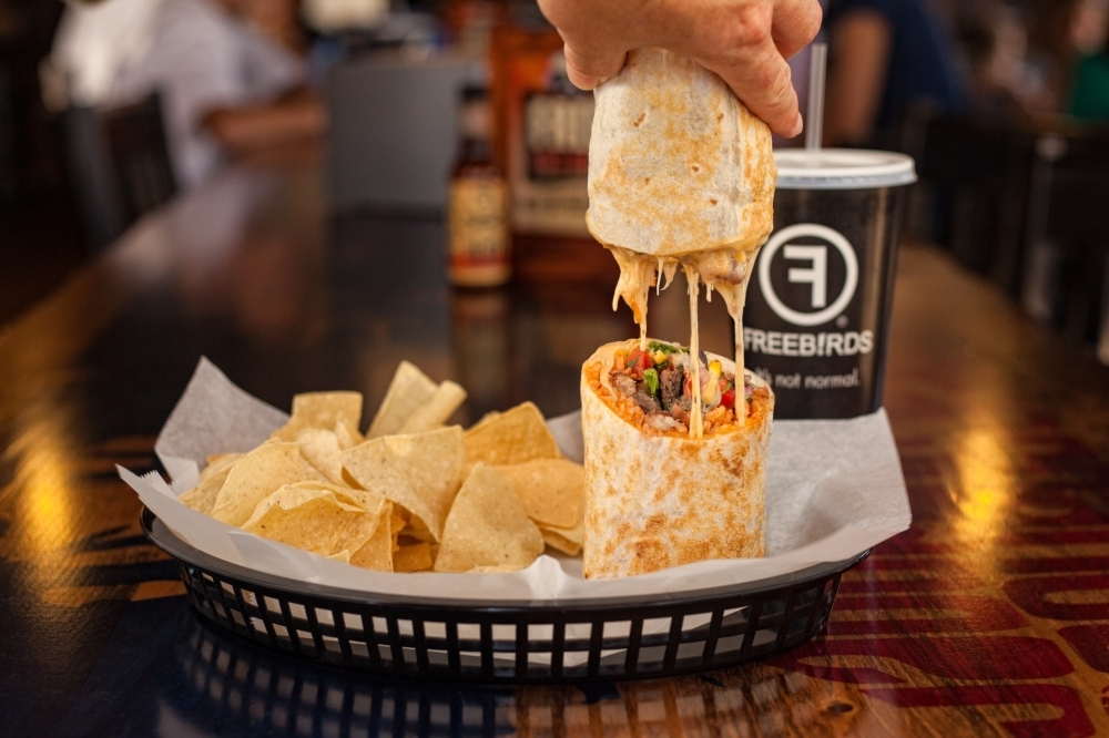 The Austin-based Tex-Mex chain offers build-your-own burritos, bowls, tacos, quesadillas, nachos and salads. (Courtesy Freebirds World Burrito)