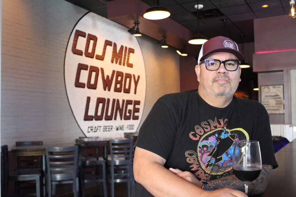 John Recio opened the Cosmic Cowboy Lounge in October 2020 after wanting to branch into a wine bar. (Andrew Christman/Community Impact Newspaper)