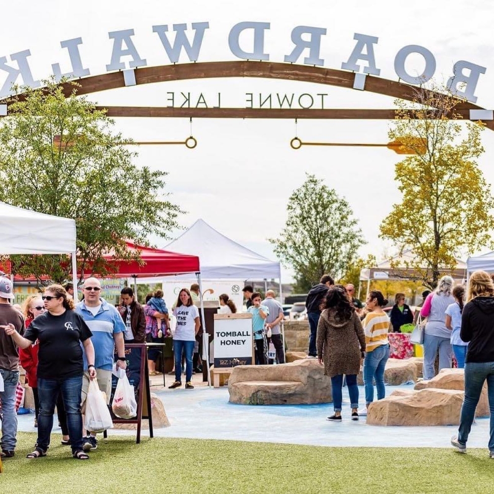 The Boardwalk at Towne Lake hosts a farmers market several times a year. (Courtesy Caldwell Companies)
