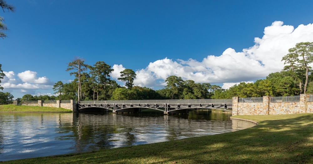 The bridge connects the East Shore community to the island on Lake Woodlands. (Courtesy Howard Hughes Corp.)