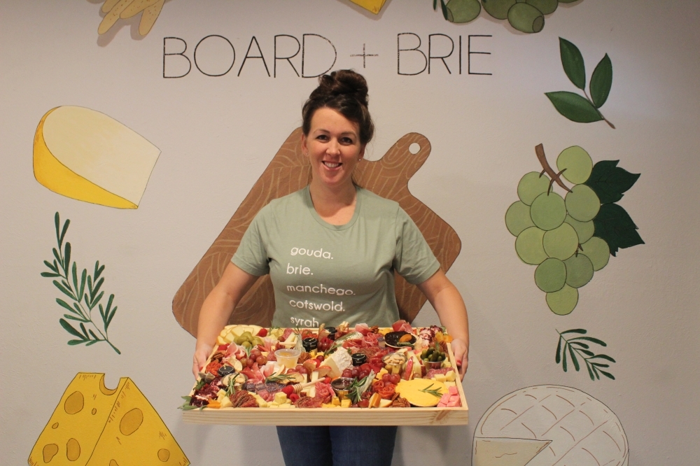 Lane Tunstall started her business Board   Brie in September 2019. (Sandra Sadek/Community Impact Newspaper)