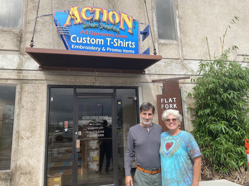 Faith Schexnayder and her husband John, share a building where the run Flatfork Studio and Action Screen Graphics.