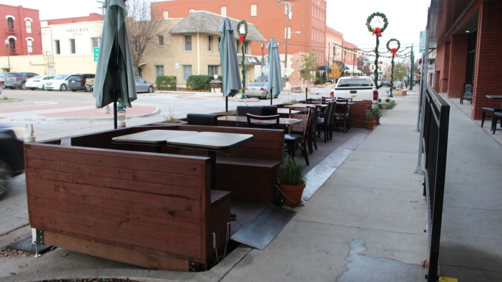 Outdoor dining areas called parklets are now a permanent fixture in downtown McKinney. (Miranda Jaimes/Community Impact Newspaper)