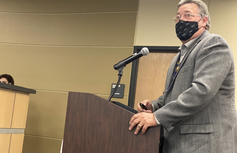 Gary Schulte, who is with the PfISD facilities and maintenance department, addressed the board Dec. 16. (Brian Rash/Community Impact Newspaper)
