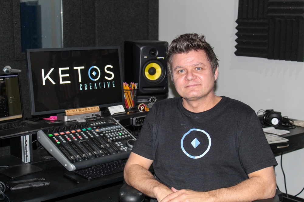 Allen Joanis said the best part of running Ketos Creative is getting to work with artists and helping them grow. (Bailey Lewis/Community Impact Newspaper)