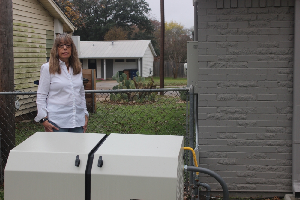 Lynn Wilson purchased a full home generator after the storm. (Darcy Sprague/Community Impact Newspaper)