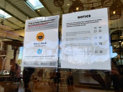 Businesses will be required to post signs stating their COVID-19 safety protocols by Jan. 17 or face a fine. (Ben Thompson/Community Impact Newspaper)