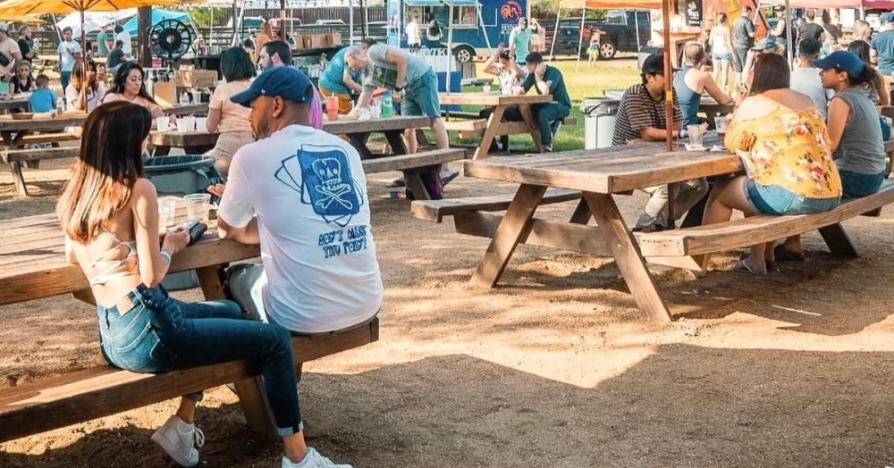 Patrons eat and drink at The Block SA, 14530 Roadrunner Way, a food truck park located near the University of Texas at San Antonio main campus. Shavano Park is close to finalizing regulations for food truck operations. (Courtesy The Block SA)