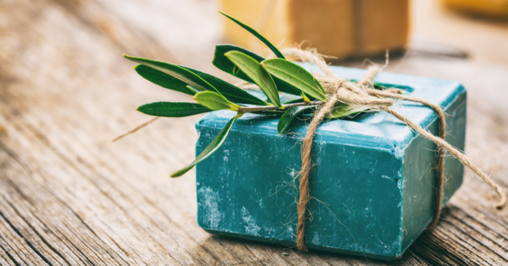 image of homemade soap tied with twine and herbs