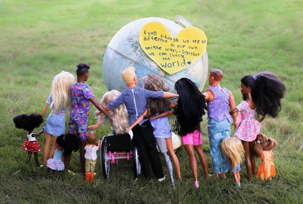 Crow's photo is titled 'Big and Small Hands Can Change the World.' (Courtesy Comal ISD)