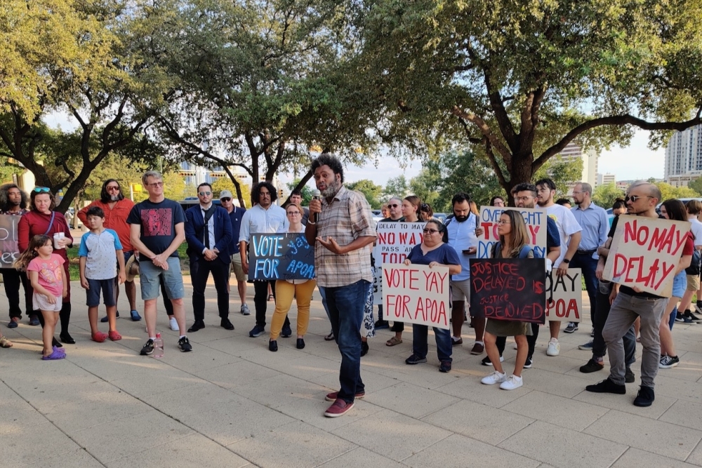 Activists gathered at City Hall ahead of council's votes on the policing items. (Ben Thompson/Community Impact Newspaper)