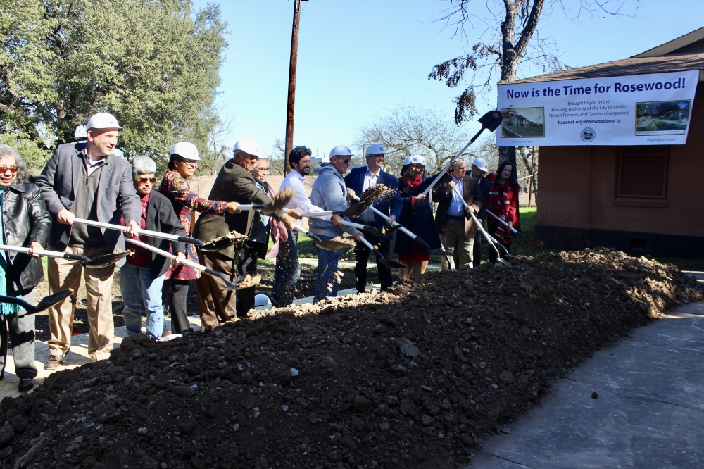 Residents, political figures and other community leaders marked the Pathways at Rosewood Courts groundbreaking Dec. 15. (Ben Thompson/Community Impact)