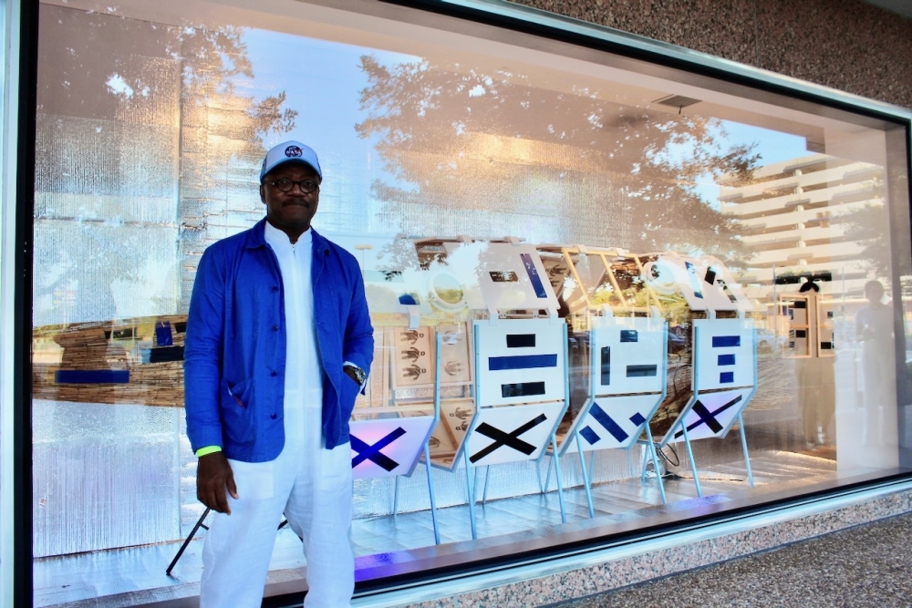 One of the two artists who art was chosen to be on display at the Ion District’s display windows is Christopher Blay. HIs work, he said, reflects the conditions that have been part of Black life in America, from triumphs of culture to socio-political situations. Blay’s display “The SpLaVCe Program,” he said, is a combination of a slave ship and a spaceship exploring the African diaspora. (Melissa Enaje/Community Impact)