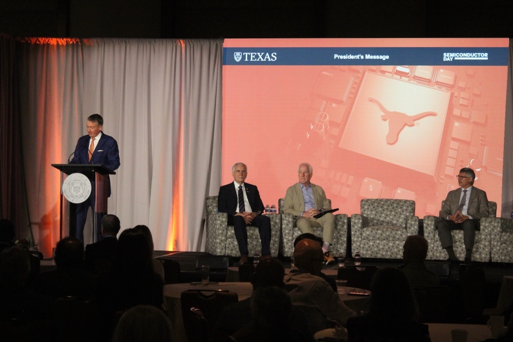 From left: UT President Jay Hartzell, U.S. Rep. Lloyd Doggett, U.S. Senator John Cornyn and Roger Bonnecaze, dean of the UT's Cockrell School of Engineering, spoke during UT's Semiconductor Day Sept. 1. (Ben Thompson/Community Impact)