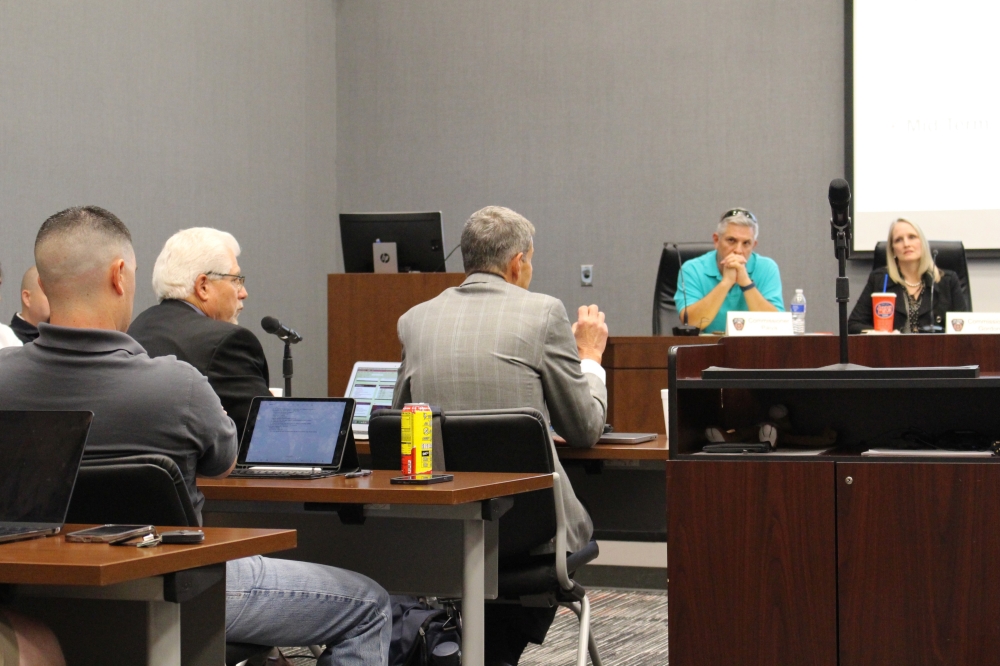 Stewart Gary (center) reviews Citygate's recommendations at a Sept. 19 meeting. (Danica Lloyd/Community Impact)