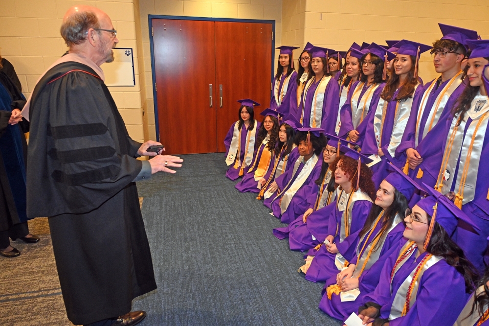 Board President Tom Jackson speaks with Jersey Village High School graduates in May 2023. (Courtesy Cy-Fair ISD)