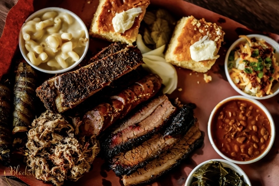 The 'showin' off platter' includes prime brisket, pulled pork, sausage, pork ribs and choice of four sides. $40. (Courtesy Sullivan, Old Town BBQ)