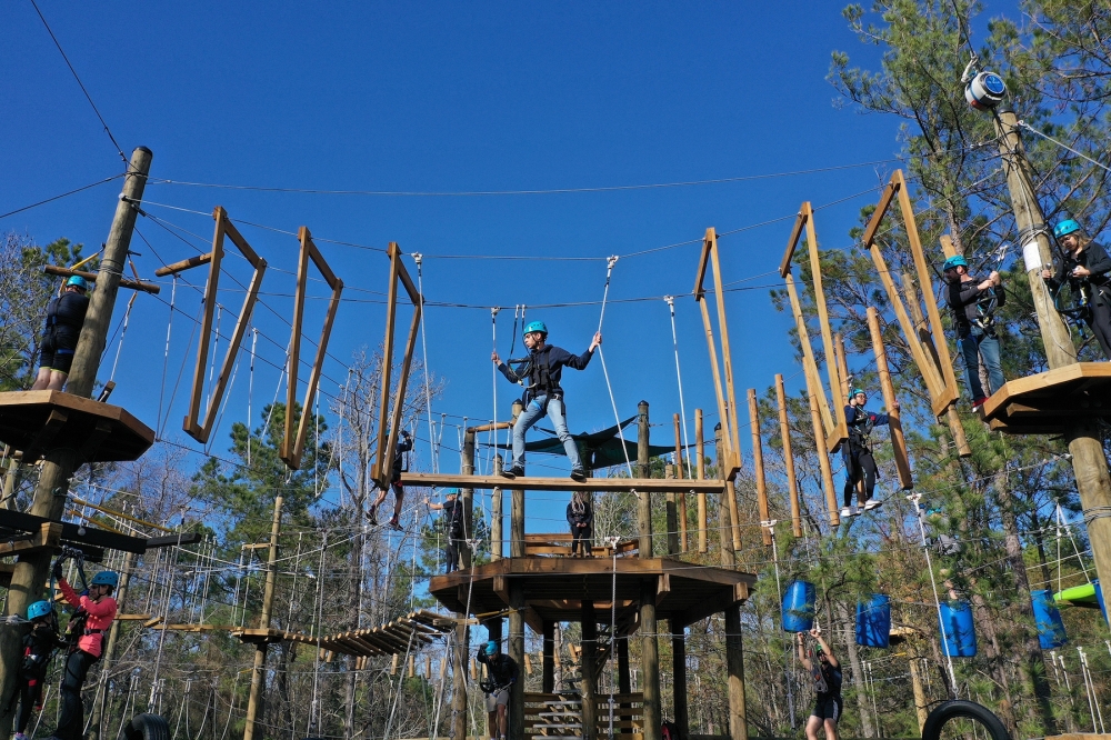 Texas TreeVentures participants can traverse trees on a series of platforms, bridges and cables up to 40 feet in the air. (Courtesy Texas TreeVentures)