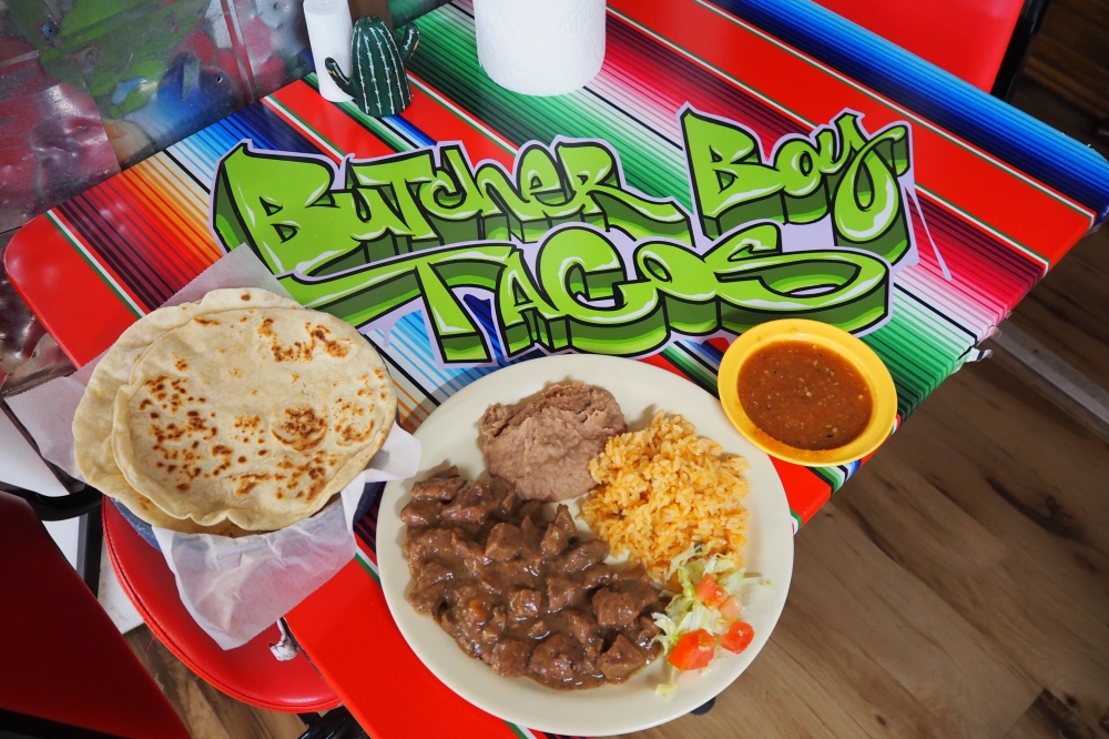Butcher Boy Taco House's carne guisada plate includes homemade carne guisada, rice and beans, as well as homemade salsa and tortillas. (Sarah Hernandez/Community Impact)