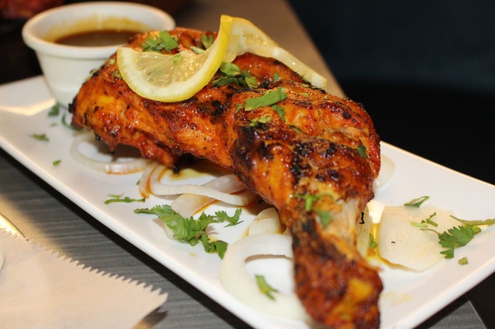 The chicken tikka leg ($8.99) is marinated with traditional Indian spices and yogurt before being grilled. (Asia Armour/Community Impact)