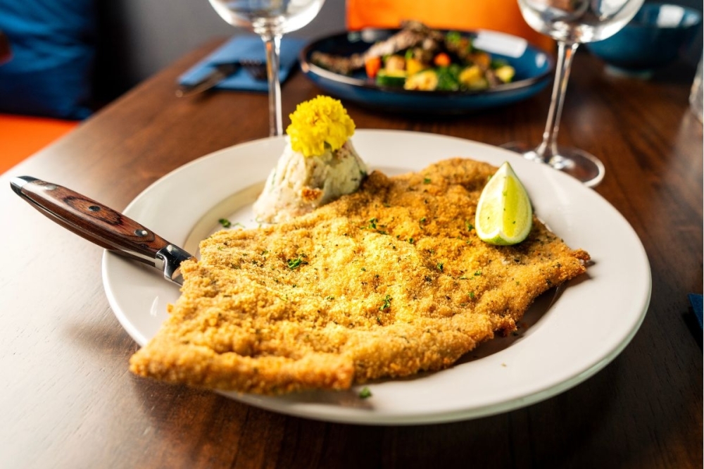 A chicken schnitzel dish influenced by the owner's grandmother is one of the items on the menu at Blue Tuba. (Courtesy Dylan McEwan)