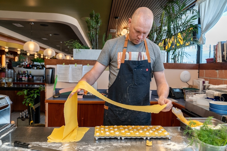Eau Tour's Executive Chef Kent Domas prepares pasta from scratch. (Courtesy Local Foods Group)