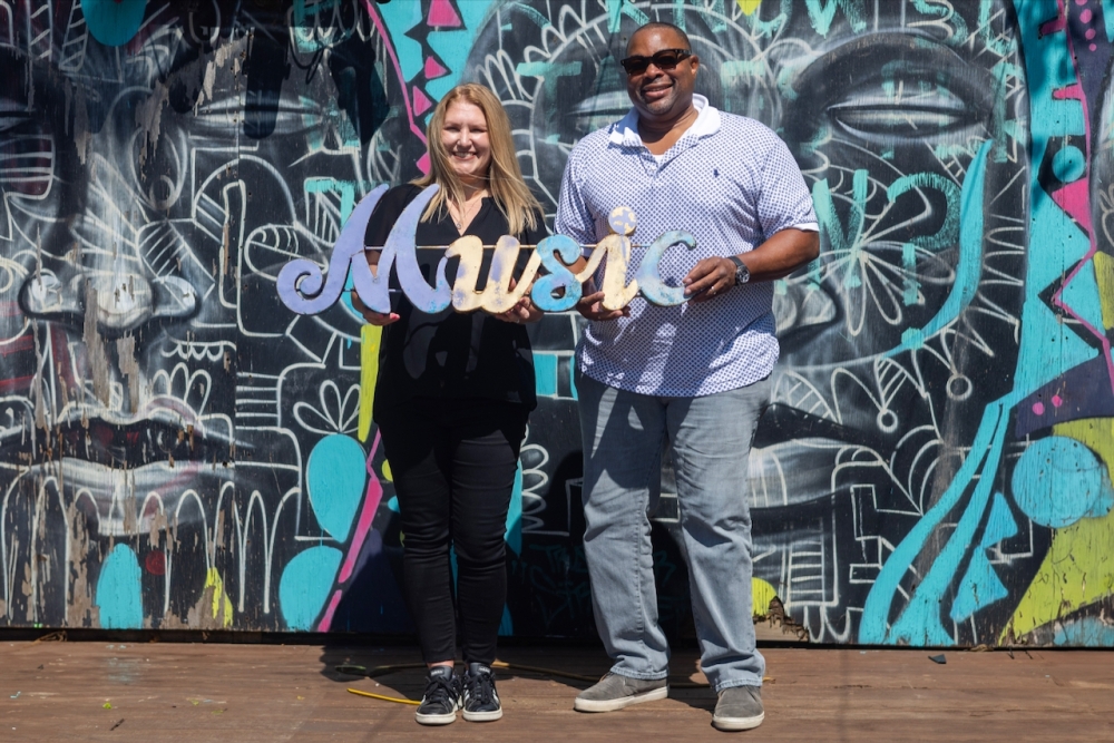 Rally Austin President and CEO Theresa Alvarez and Board Chair Carl Settles Jr. marked the organization's rebranding in June. (Courtesy Rally Austin)
