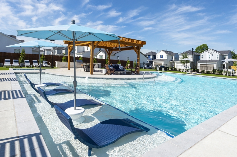 Inspire Homes also offers renters community amenities, such as a a clubhouse with a fitness center and lounge area; a children’s playground; a dog park; and a pool with a firepit, courtyard and grilling area. (Courtesy Inspire Homes)