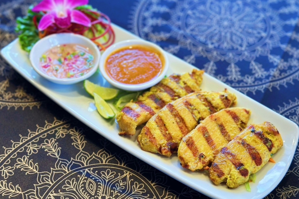 Chicken satay is grilled and marinated chicken served with fresh cucumber sauce and peanut sauce. (Courtesy Absolute Thai Cuisine)
