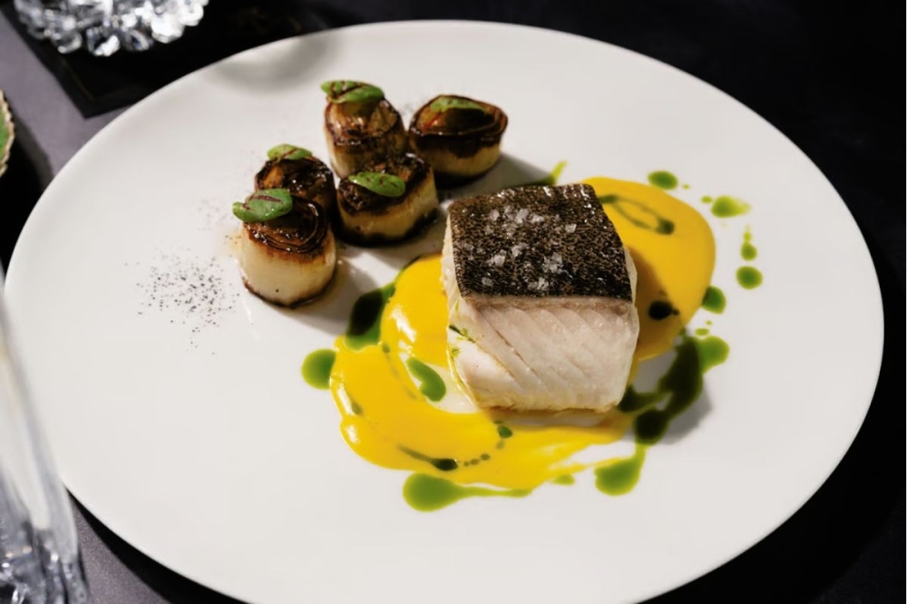 Turner's Cut menu features premium cuts of meat from Japan and the U.S. Composed dishes include the seasonal fish plate, with saffron sauce, chard leek and green oil ($48). (Courtesy Berg Hospitality Group)