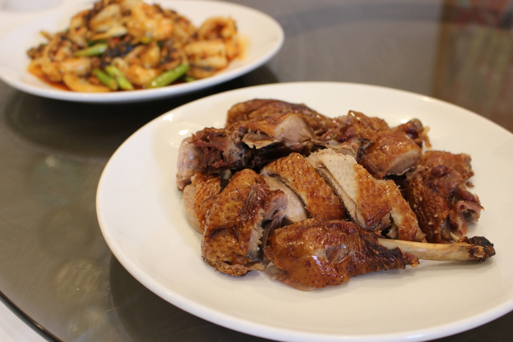 The tea smoked duck is marinated over night and is one of the restaurant's most well known dishes, Chang said. (Asia Armour/Community Impact)