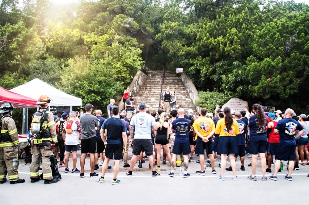 Participants gather by the staircases at Mount Bonnell in Austin for the Wake Up Stronger Climb. (Courtesy Wake Up Stronger)