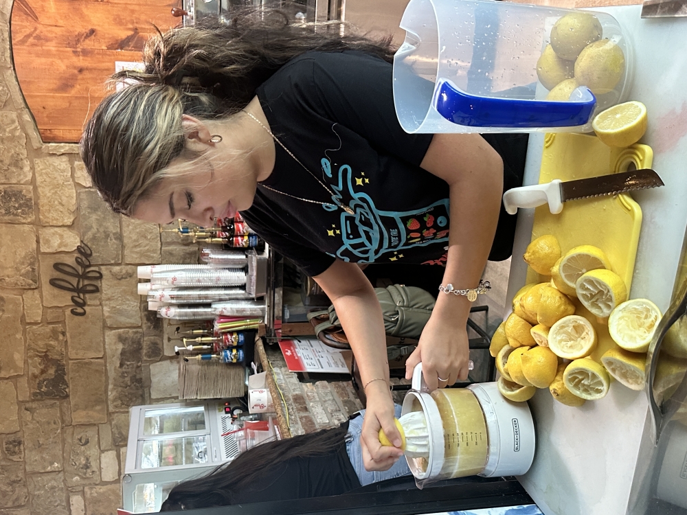 Mr. Brew Coffee barista Angelina Rodriguez makes fresh lemonade each day. (Amanda Cutshall/Community Impact)