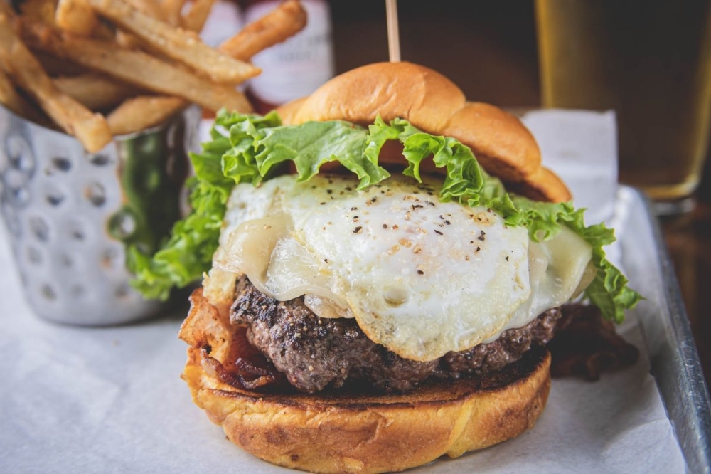 Ramble Creek Grill is known for its half pound burgers, staff said. (Courtesy Ramble Creek Grill Riverstone)